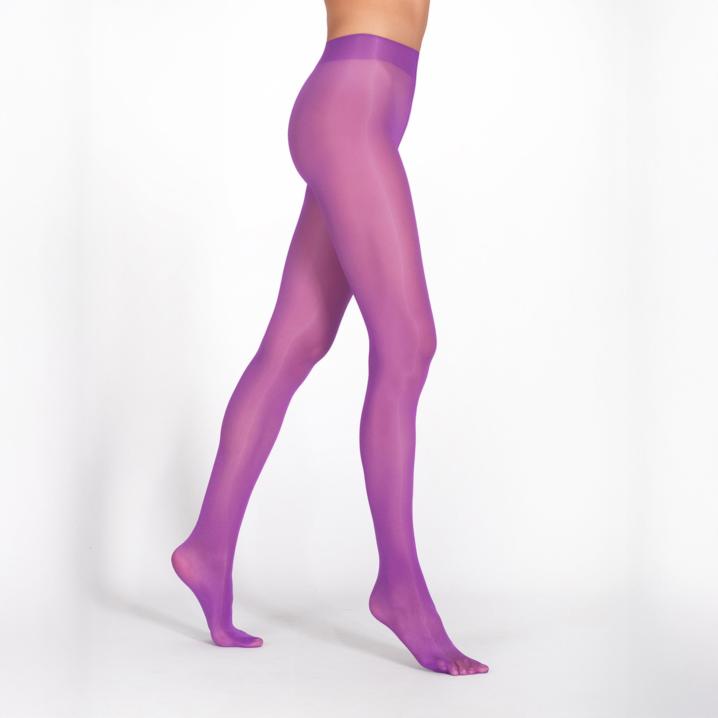 Purple tights worn by a person on a white background